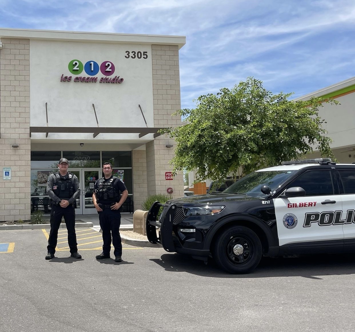 Photo of two Gilbert officers outside 212 Ice Cream Studio