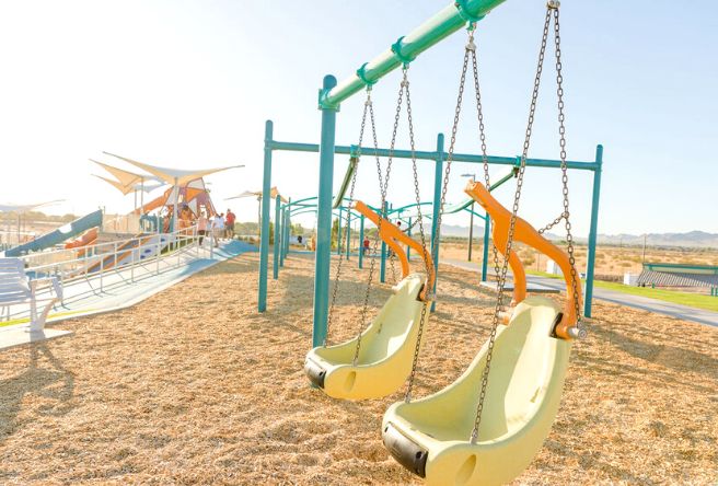 A view of Gilbert Regional Park and the wood chips below the playground.