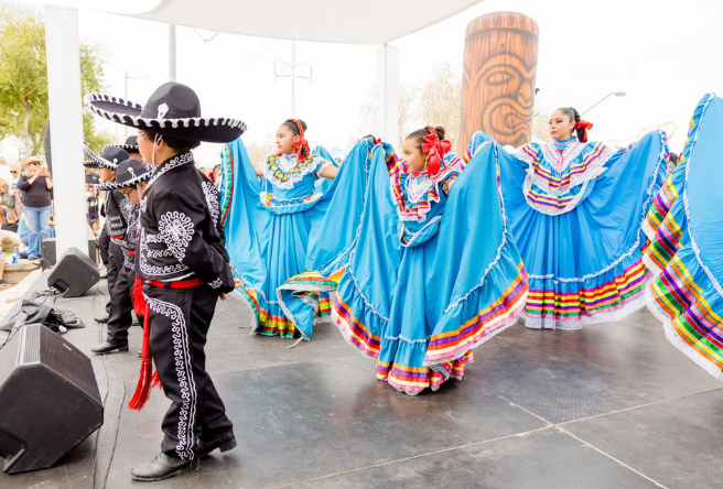 Ballet Folklorico Amistad performs on stage during the Global Village Festival in Gilbert.