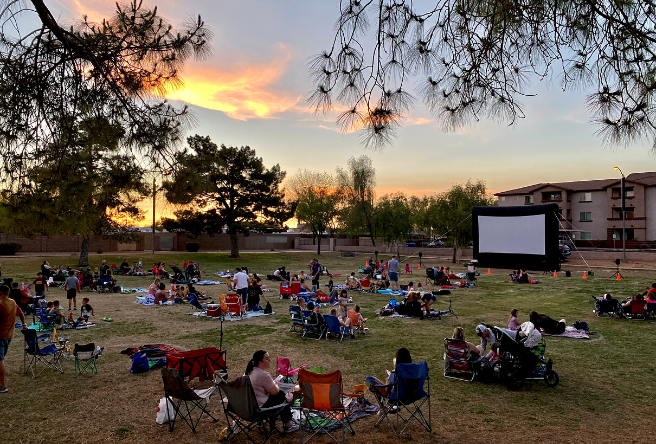 The sun sets at Page Park during a free movie showing.