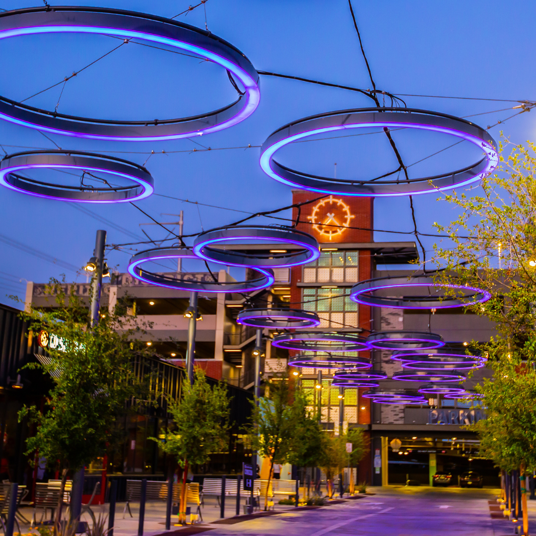 The entrance to a parking garage at night in downtown Gilbert.