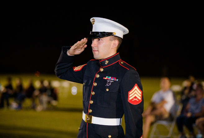 A member of the military salutes from the crowd at the 2021 Gilbert Veterans Day Ceremony.