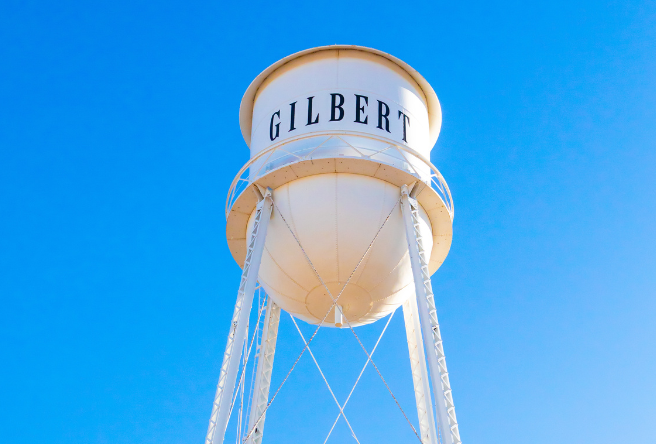 A photo of Gilbert's iconic water tower against a bright blue sky.