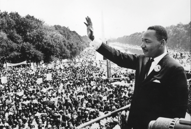 A photo of Martin Luther King, Jr. addressing a crowd.