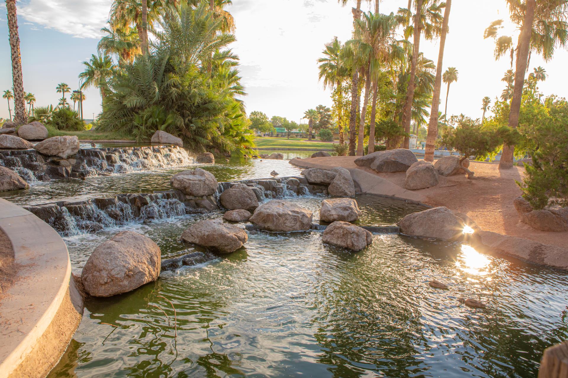 A photo of a waterfall at sunset at Freestone Park.