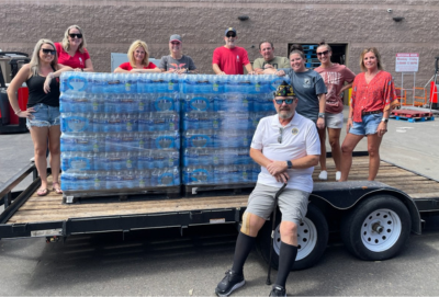 American Legion Post 39 donates crates of water to the Heat Relief Network.