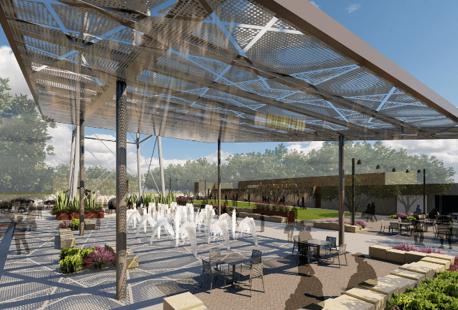 A design rendering of what the new Water Tower Plaza will look like after construction in 2024, featuring shade structures, a grassy area, and a splash pad.