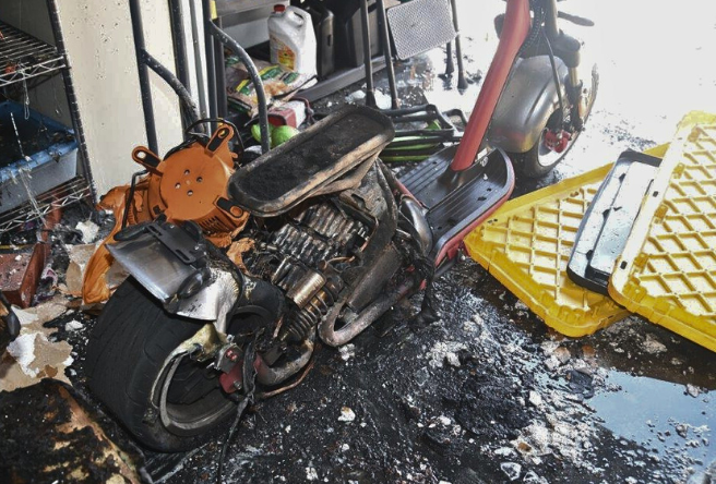 A photo of a scooter that was burned in a battery fire.