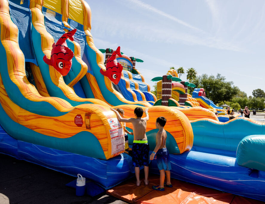 This is a cover photo of water inflatables for H2O Fest. 